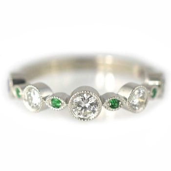 Unique round diamond emeralds custom wedding ring
