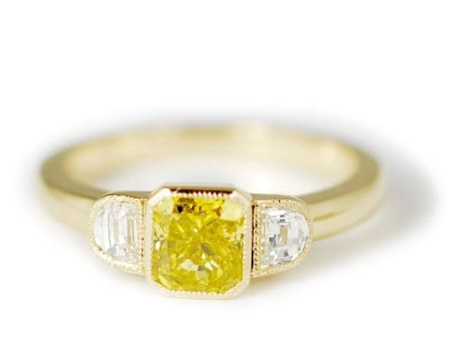 YELLOW DIAMOND RING WITH HALF MOON ACCENTS
