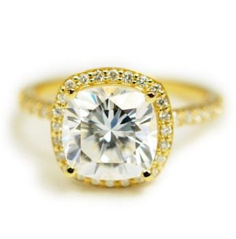 Ethical custom engagement ring made with 14k yellow gold, 2.00 carat antique cut lab-grown moissanite, and diamond halo custom made and designed by Abby Sparks Jewelry, The Laura.