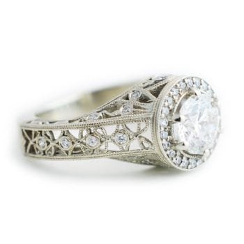Right side profile and details of the The Sherri, an engagement ring made of white gold, filigree band, 1.06 carat diamond, and 0.75 ctw melee diamonds custom made by Abby Sparks Jewelry.