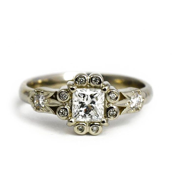 Vintage inspired custom engagement ring made with 14k white gold, 0.5 carat princess cut diamond, and 0.2 ctw diamond accents custom made and designed by Abby Sparks Jewelry, The Korey.