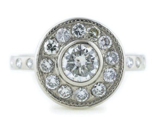 PALLADIUM ROUND CUT OVAL HALO RING