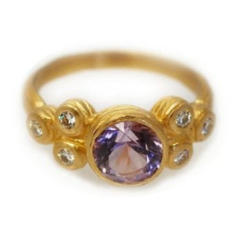 Custom handmade engagement ring made with 14k yellow gold and 1.5 carat amethyst with diamond accents custom made and designed by Abby Sparks Jewelry, The Amy.