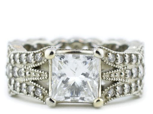 DIAMOND RING WITH DIAMOND STUDDED BAND