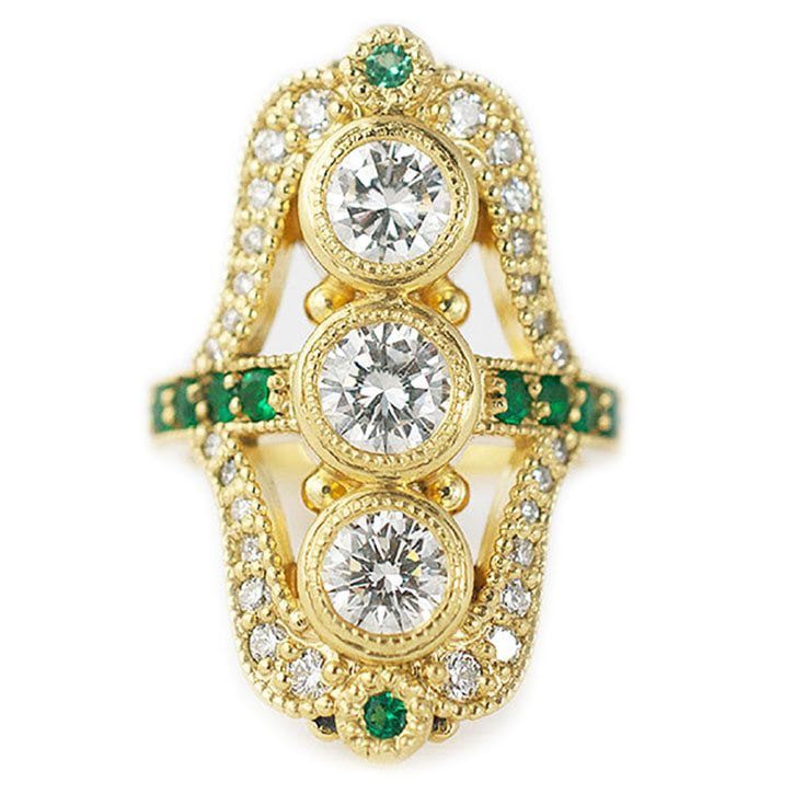 Custom engagement ring made with 18k yellow gold, three 0.5 carat center diamonds, 0.31 ctw accent diamonds, and 0.3 ctw accent emeralds, vintage inspired, custom made and designed by Abby Sparks Jewelry, The Jacqueline.