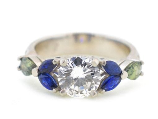 ROUND DIAMOND AND SAPPHIRE RING
