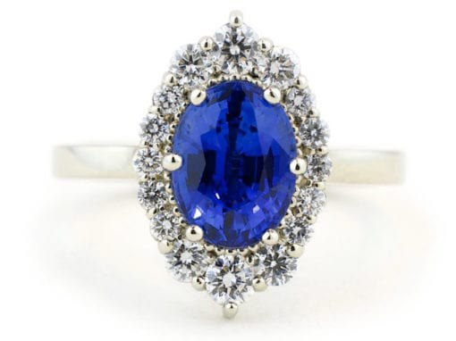 Oval Bright Blue Sapphire Halo Ring